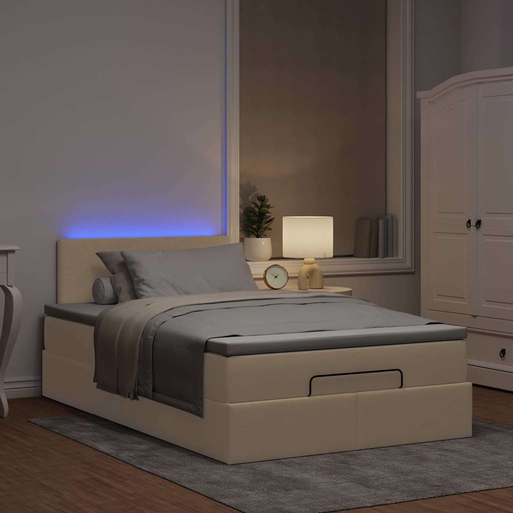 Ottoman bed met matras en LED's 120x190cm stof crèmekleurig